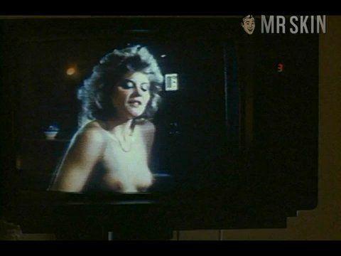 Ginger Lynn Allen Naked as Girl on TV (uncredited). Breasts. 189705