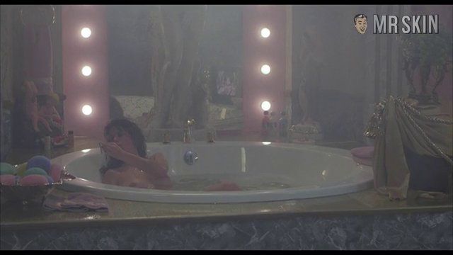 Nancy Travis Naked in Married to the Mob. Breasts, butt. 184375