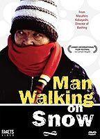 Man Walking on Snow Breasts 67976